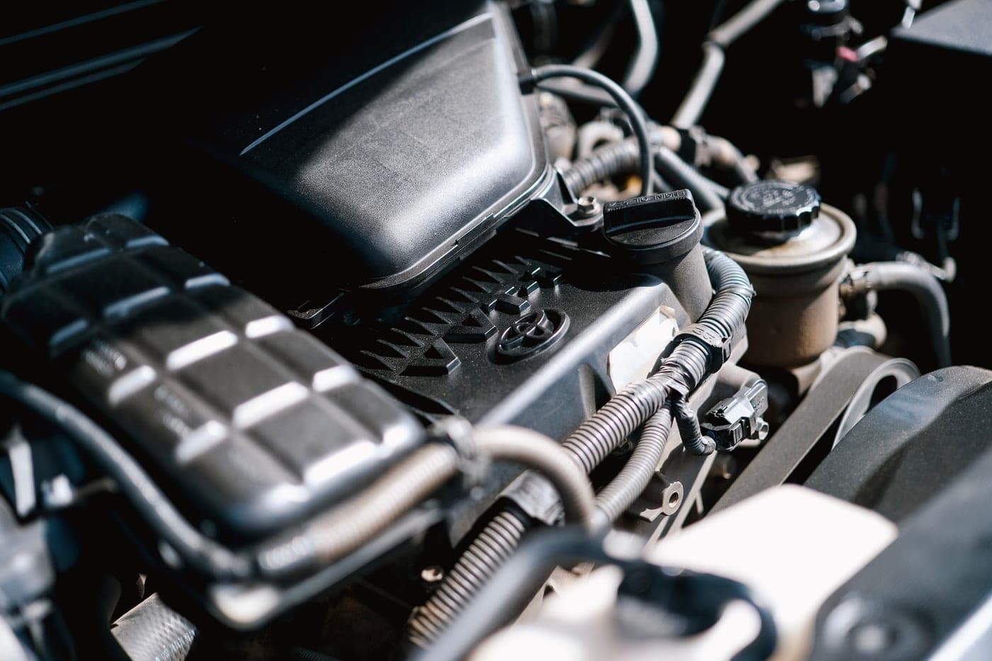 An open engine bay showing wiring and components