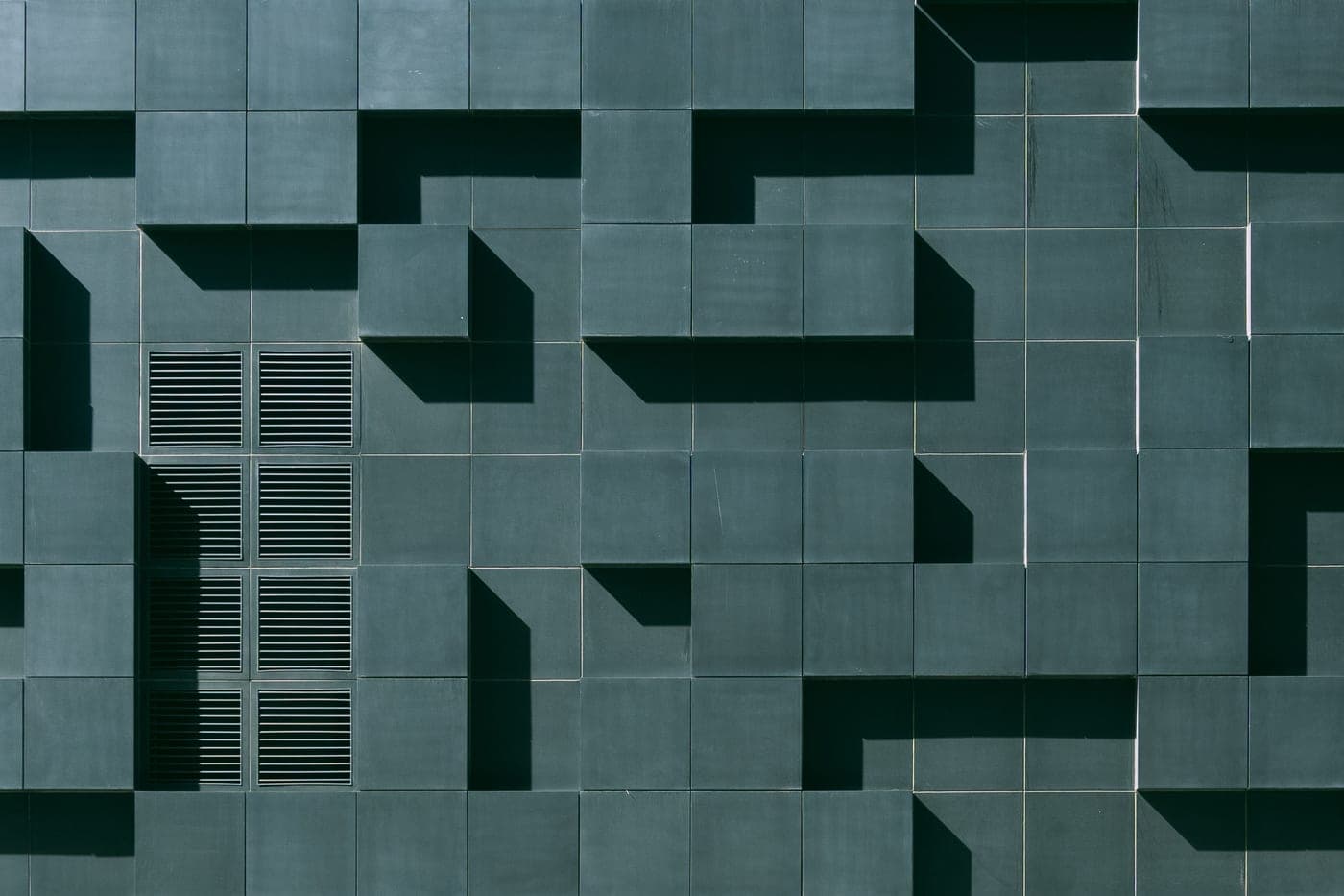 A grid of four squares in a minimal geometric pattern