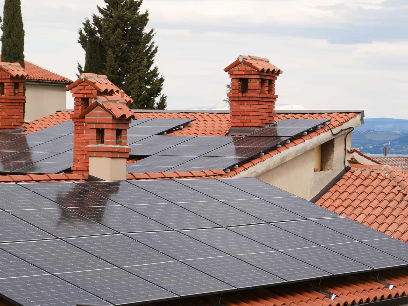 Solar panels installed at an angle against an open sky